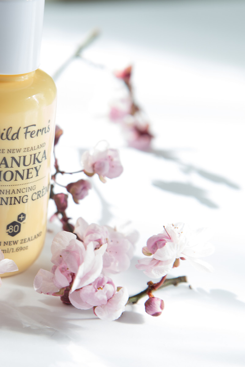 Manuka blossom and beauty product still life.